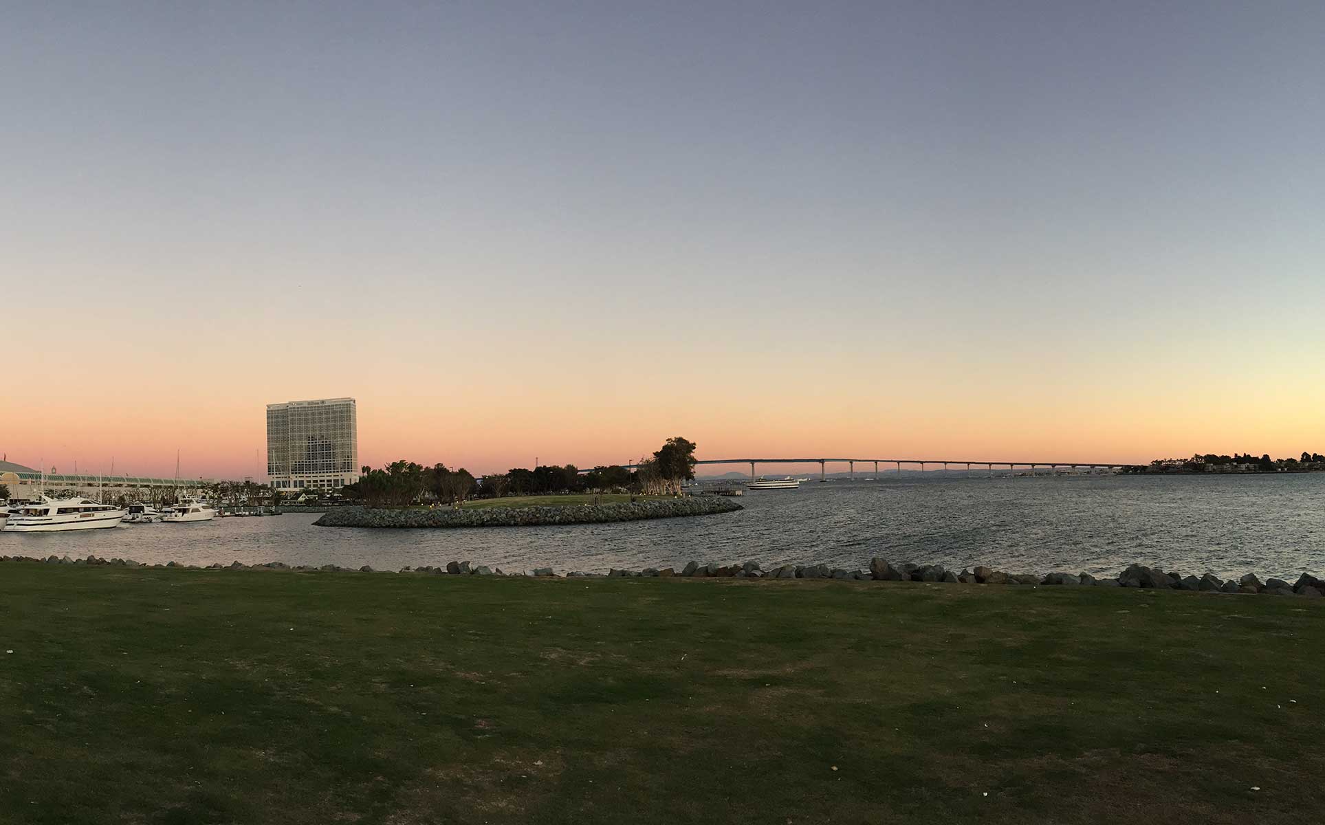 The San Diego Bay with a view of Coronado bridge. With the sun setting.