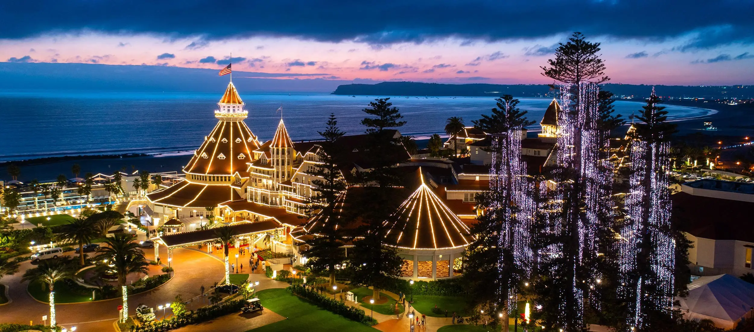 Aerial View in the Evening of Hotel del Coronado lit up with Christmas Lights