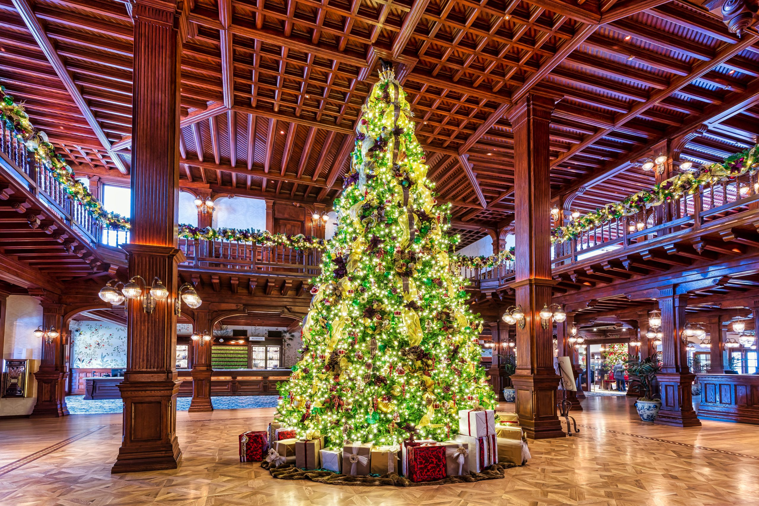 Tall Evergreen With Lights and Presents in Lobby of Hotel Del Coronado