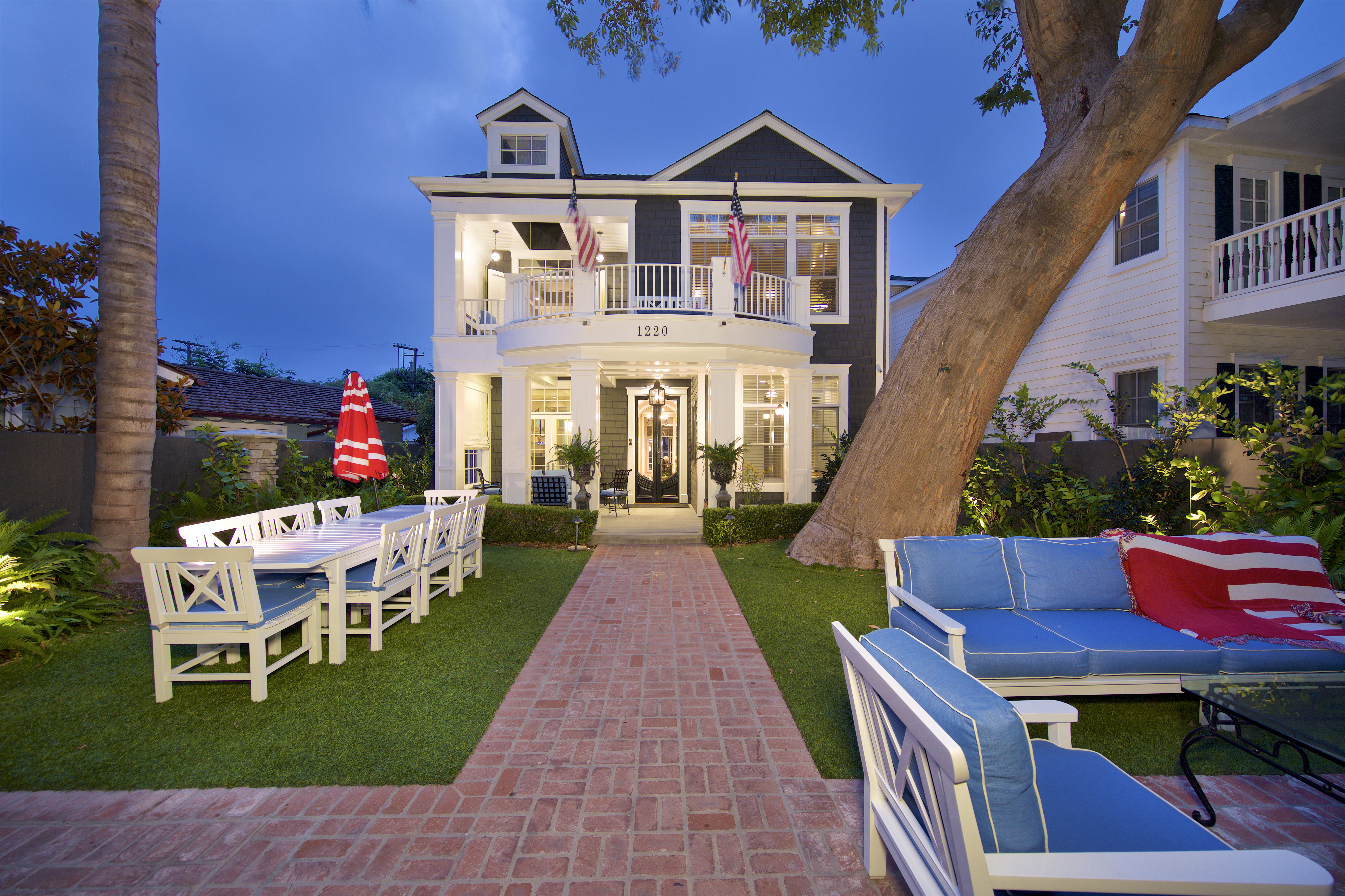Coronado home exterior with manicured landscaping and welcoming front porch