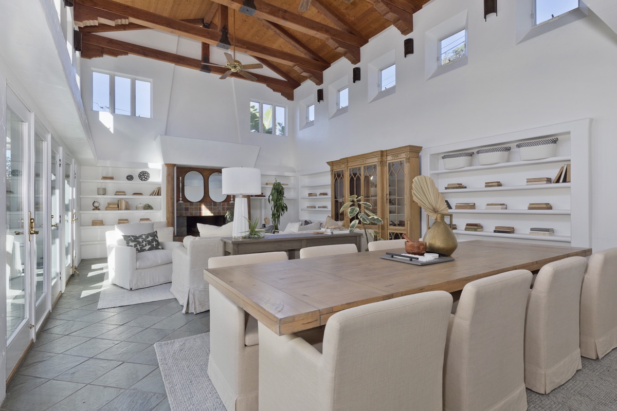 Light coastal inspired interior with vaulted cathedral ceiling at a Coronado Beach house sold by top agent Whitney Benzian