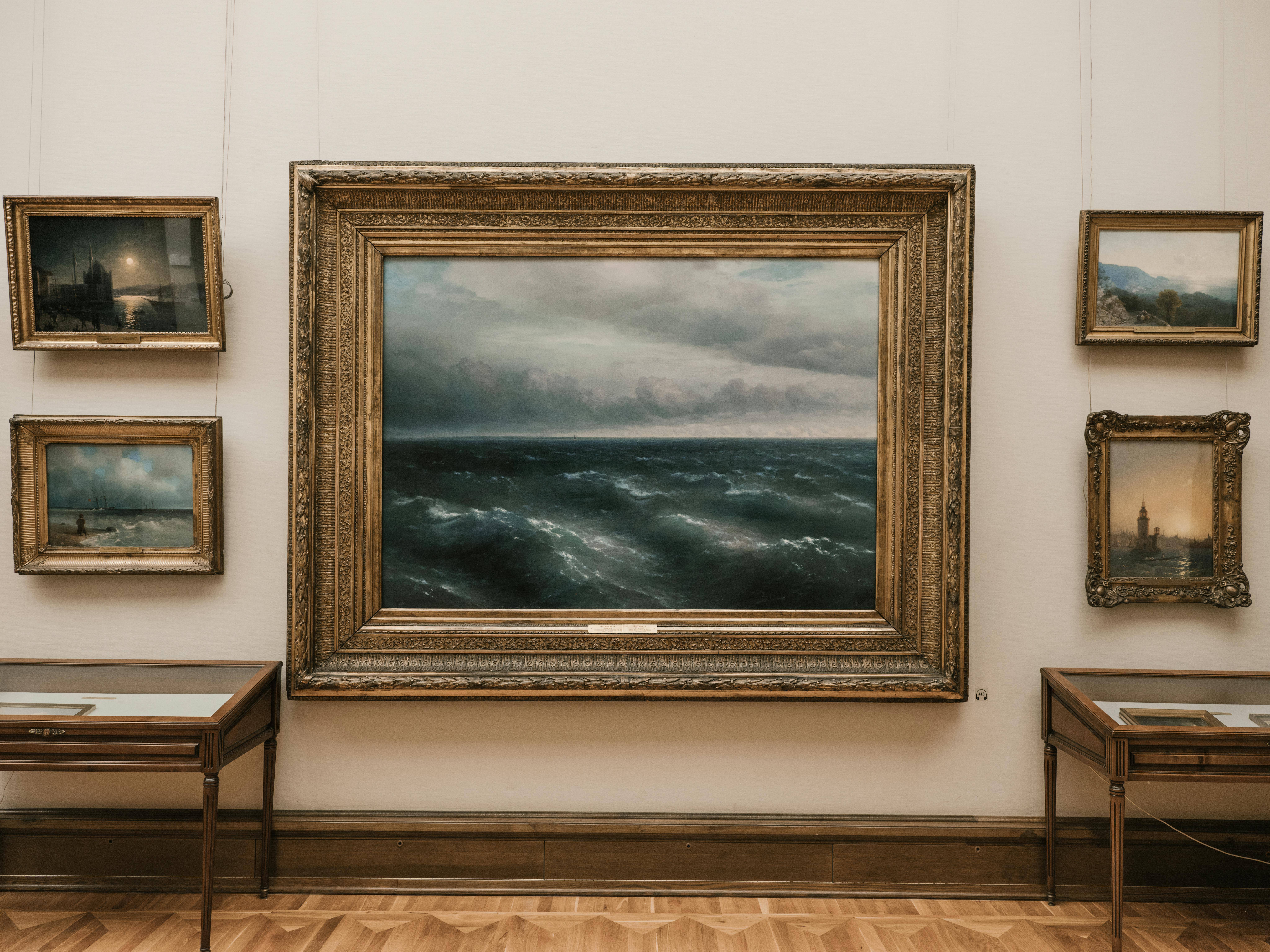 Art in Coronado with gallery framed paintings representing luxury investments like homes for sale by top local Realtor agents Whitney Benzian real estate team