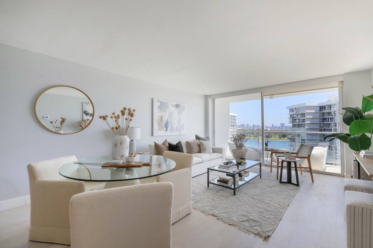 Living and dining room of Coronado Shores condo sold by top local Realtor agent Whitney Benzian real estate