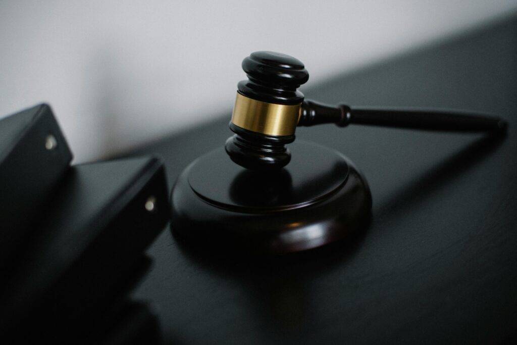 Photo of a wooden gavel representing that creating a will for your Coronado real estate property through probate can avoid lengthy legal processes.