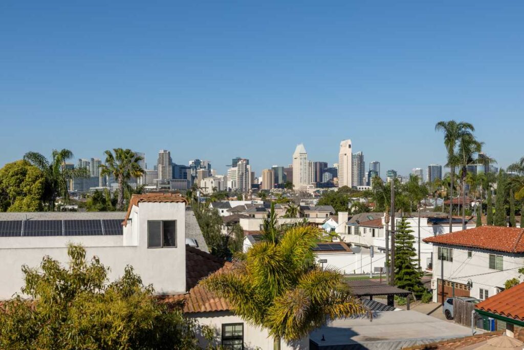 View of San Diego skyline from the roof deck of a luxury Coronado real estate listing sold by the best local Realtor agent Whitney Benzian