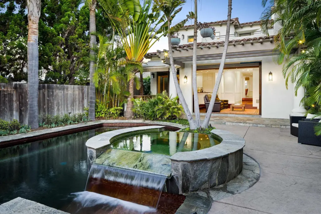 Backyard pool and spa of a property sold by Whitney Benzian, top choice for homeowners looking to sell your Coronado home fast and for the most money.